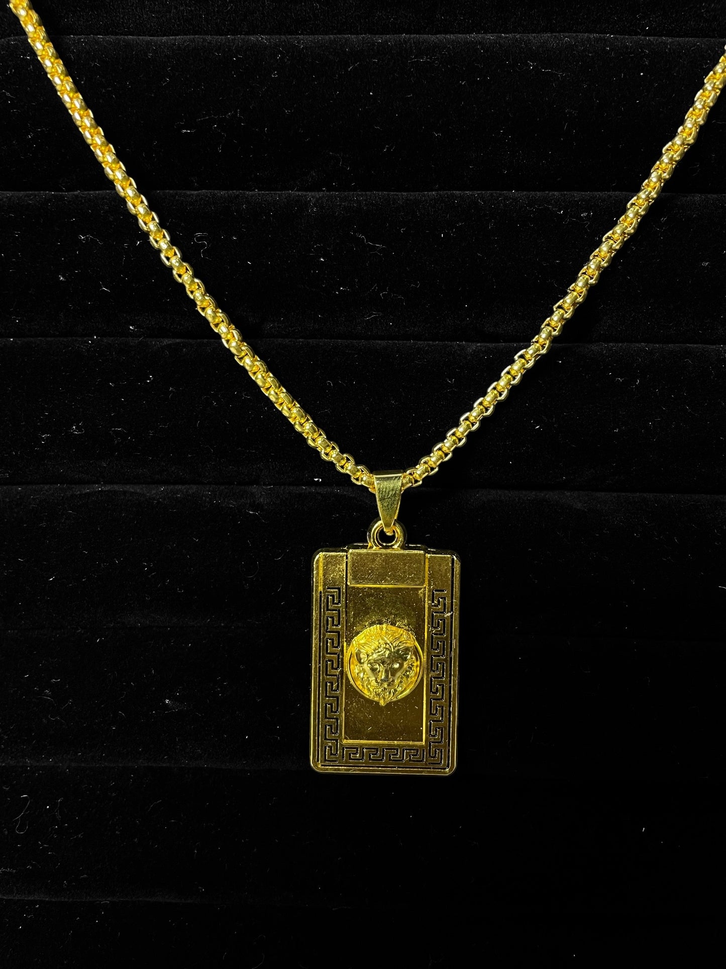 Gold medusa pendant