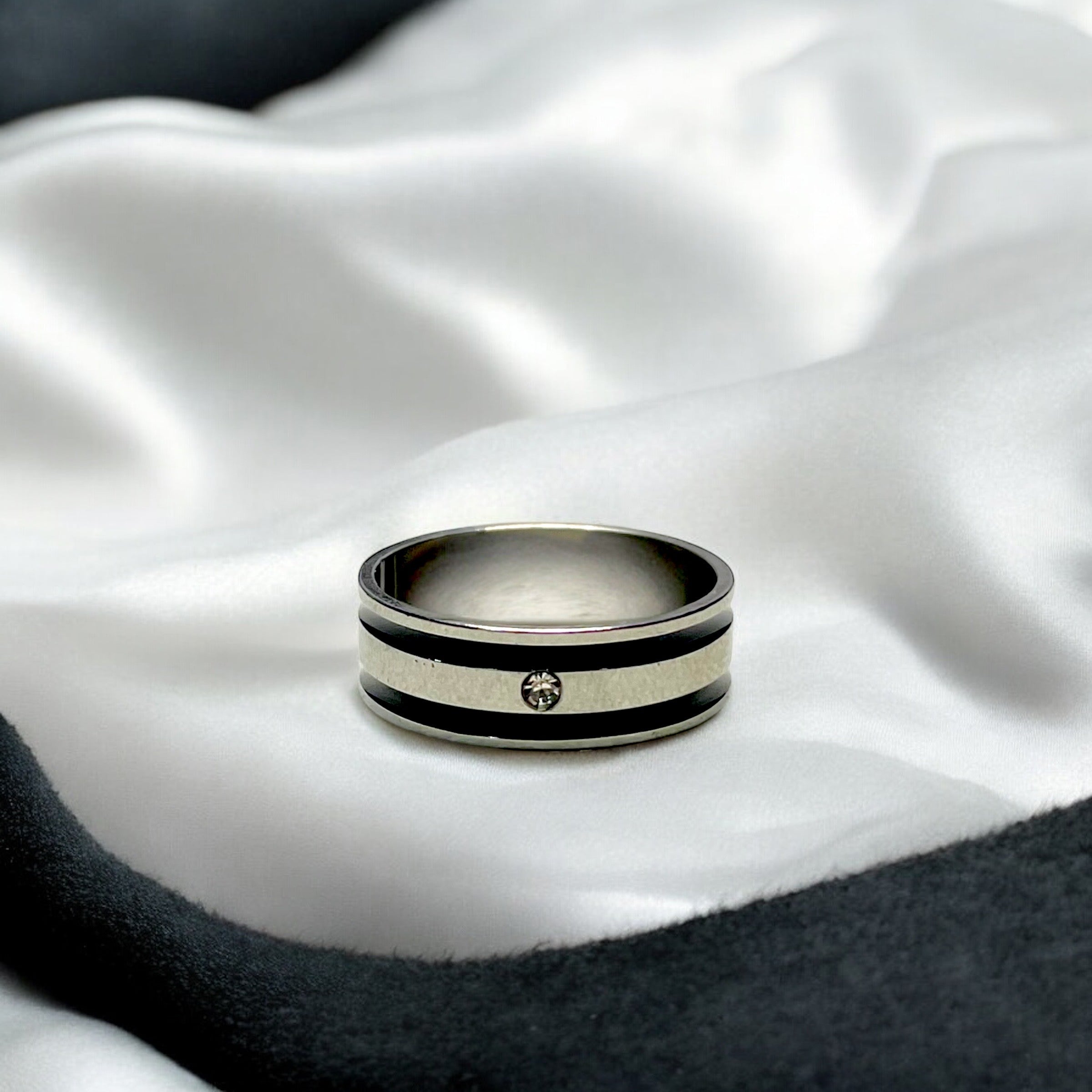 black and silver stone ring