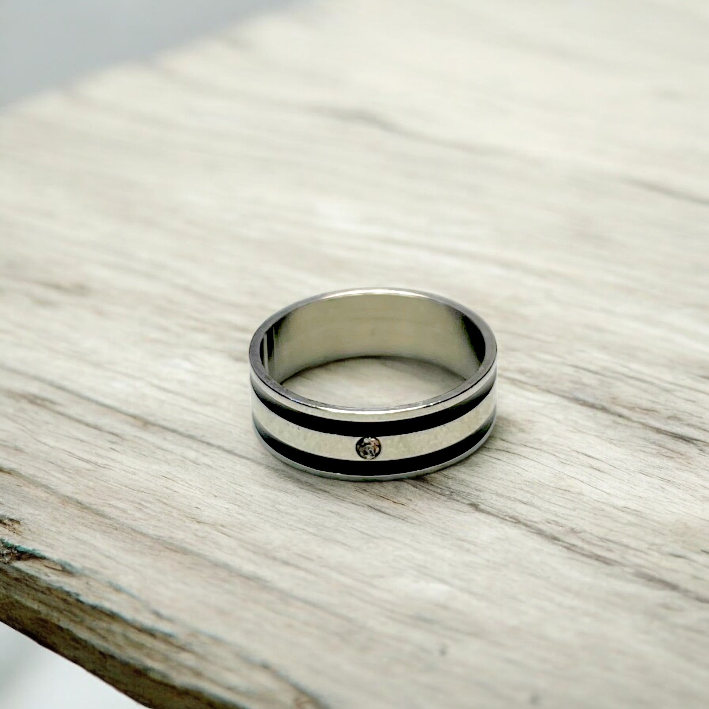 black and silver stone ring